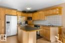 2 Pineview Horizon Village, St. Albert, AB  - Indoor Photo Showing Kitchen With Double Sink 