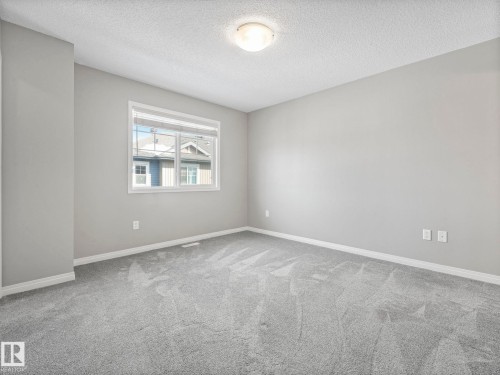 Primary Bedroom - 27 1030 Chappelle Boulevard, Edmonton, AB - Indoor Photo Showing Other Room