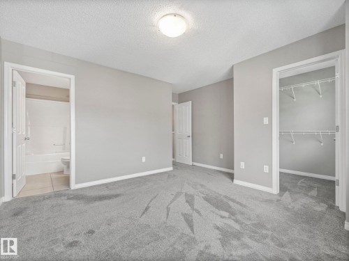 Primary Bedroom - 27 1030 Chappelle Boulevard, Edmonton, AB - Indoor Photo Showing Other Room