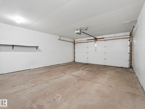 27 1030 Chappelle Boulevard, Edmonton, AB - Indoor Photo Showing Garage