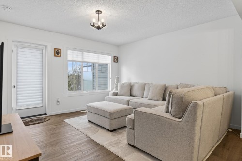 7 50 Mclaughlin Drive, Spruce Grove, AB - Indoor Photo Showing Living Room