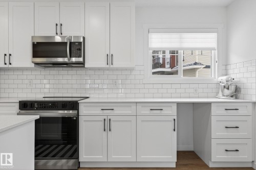 7 50 Mclaughlin Drive, Spruce Grove, AB - Indoor Photo Showing Kitchen