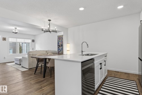 7 50 Mclaughlin Drive, Spruce Grove, AB - Indoor Photo Showing Kitchen With Double Sink