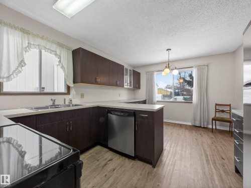 5116 37 Avenue, Edmonton, AB - Indoor Photo Showing Kitchen With Double Sink