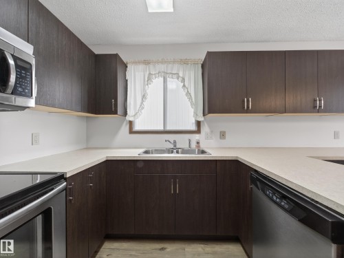 5116 37 Avenue, Edmonton, AB - Indoor Photo Showing Kitchen With Double Sink