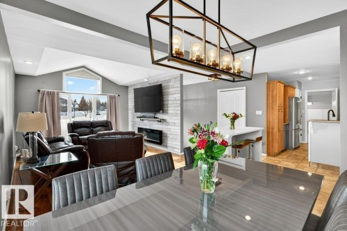 10 Oakridge Drive S, St. Albert, AB - Indoor Photo Showing Dining Room With Fireplace