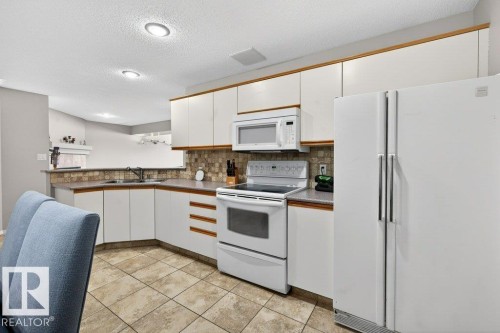 10 Oakridge Drive S, St. Albert, AB - Indoor Photo Showing Kitchen With Double Sink