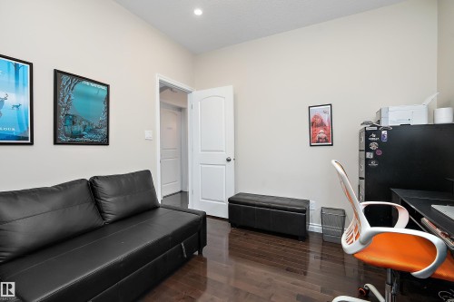 Office with dark wood finished floors and recessed lighting - 10623 75 Avenue, Edmonton, AB - Indoor