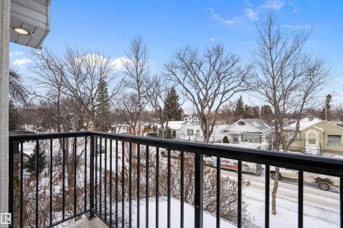 Snow covered back of property with a residential view - 10623 75 Avenue, Edmonton, AB - Outdoor