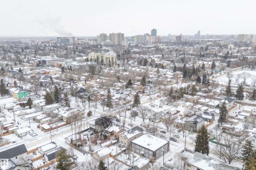 Snowy aerial view featuring a city view - 10623 75 Avenue, Edmonton, AB - Outdoor With View