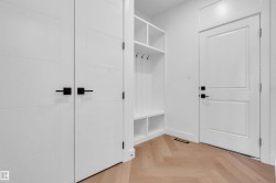 Mudroom featuring parquet floors - 
