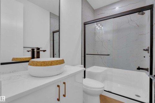 Bathroom with vanity and a marble finish shower - 108 Eldridge Point(E), St. Albert, AB - Indoor Photo Showing Bathroom