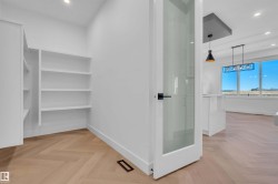 Walk in closet with parquet flooring - 