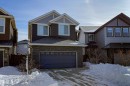 Craftsman inspired home with stone siding, a shingled roof, and an attached garage - 2237 56 Street, Edmonton, AB  - Outdoor With Facade 