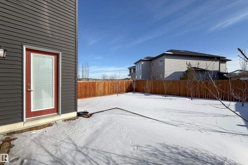 View of fenced backyard - 2237 56 Street, Edmonton, AB - Outdoor With Exterior