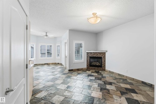 9 3003 34 Avenue, Edmonton, AB - Indoor With Fireplace