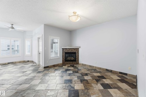 9 3003 34 Avenue, Edmonton, AB - Indoor With Fireplace