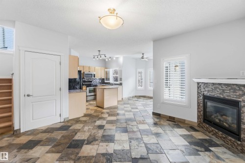 9 3003 34 Avenue, Edmonton, AB - Indoor Photo Showing Living Room With Fireplace