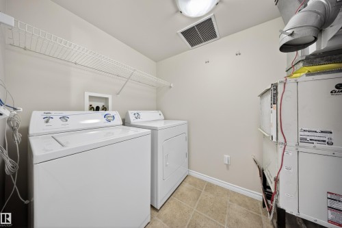 102 1589 Glastonbury Boulevard, Edmonton, AB - Indoor Photo Showing Laundry Room