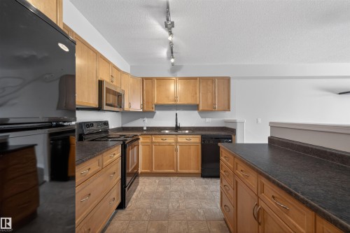 102 1589 Glastonbury Boulevard, Edmonton, AB - Indoor Photo Showing Kitchen