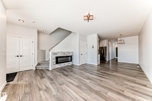 22 Meadowview Way, Leduc, AB - Indoor Photo Showing Other Room With Fireplace