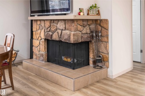 1706 West Oak Close, Edmonton, AB - Indoor Photo Showing Other Room With Fireplace