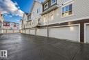 Rear view of house featuring a residential view - #127 2905 141 Street, Edmonton, AB  - Outdoor 
