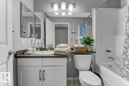 Full bathroom featuring shower / tub combo and vanity - #127 2905 141 Street, Edmonton, AB - Indoor Photo Showing Bathroom