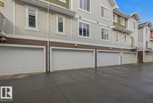 Garage with driveway - #127 2905 141 Street, Edmonton, AB - Outdoor With Exterior