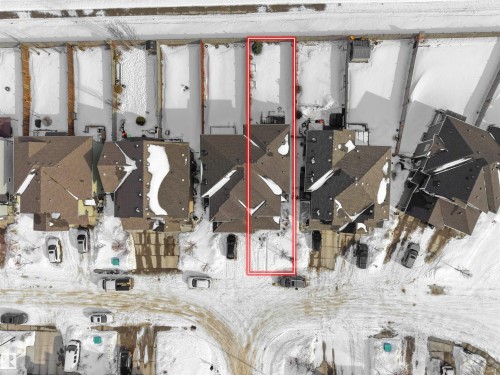 Aerial view of residential area with property boundaries highlighted - 8921 217 St Nw, Edmonton, AB - Indoor Photo Showing Basement
