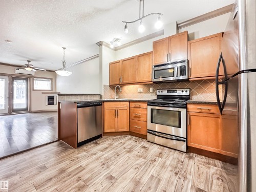 121 10121 80 Avenue, Edmonton, AB - Indoor Photo Showing Kitchen With Stainless Steel Kitchen
