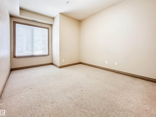 121 10121 80 Avenue, Edmonton, AB - Indoor Photo Showing Other Room