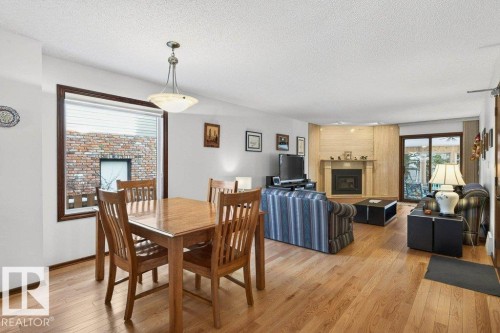41 Pineridge Crescent, St. Albert, AB - Indoor Photo Showing Dining Room With Fireplace