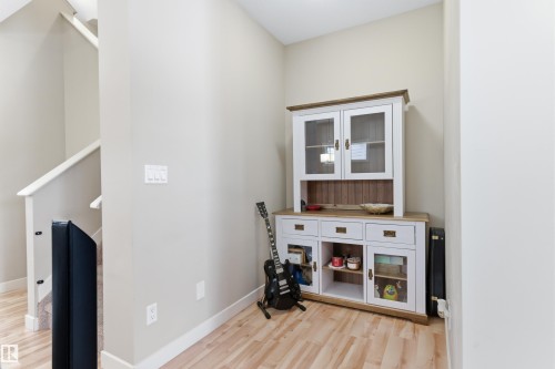 Interior space with light wood-style floors and baseboards - 149 Hawks Ridge Boulevard, Edmonton, AB - Indoor Photo Showing Other Room