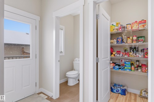 Bathroom with toilet and a closet - 149 Hawks Ridge Boulevard, Edmonton, AB - Indoor