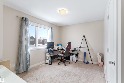 Home office with light carpet and baseboards - 149 Hawks Ridge Boulevard, Edmonton, AB - Indoor Photo Showing Office