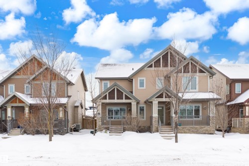 Craftsman inspired home with stone siding - 149 Hawks Ridge Boulevard, Edmonton, AB - Outdoor With Facade