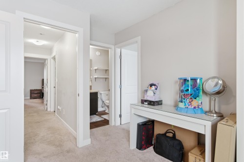 Hall with light carpet - 149 Hawks Ridge Boulevard, Edmonton, AB - Indoor Photo Showing Other Room
