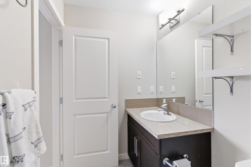 Bathroom with vanity - 149 Hawks Ridge Boulevard, Edmonton, AB - Indoor Photo Showing Bathroom