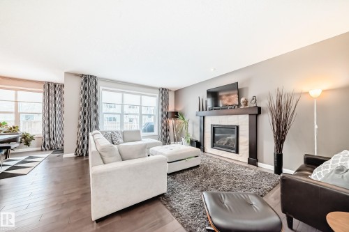7014 170A Avenue, Edmonton, AB - Indoor Photo Showing Living Room With Fireplace