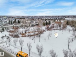 Snowy aerial view with a residential view - 