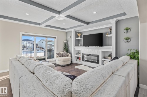 7 Southbridge Drive, Calmar, AB - Indoor Photo Showing Living Room With Fireplace