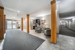 Building lobby featuring a textured ceiling - 