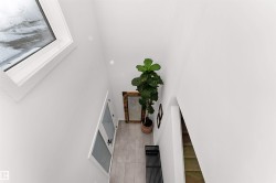 View from the top looking down at the foyer and ground level. - 