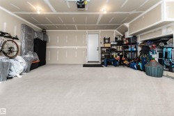 Double oversized garage with storage and mechanical room. - 