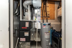 Double oversized garage with storage and mechanical room. - 