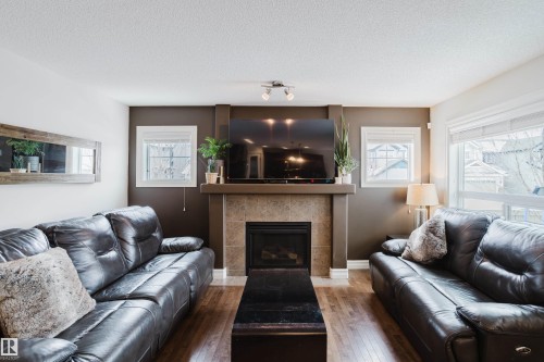 1740 59 Street, Edmonton, AB - Indoor Photo Showing Living Room With Fireplace