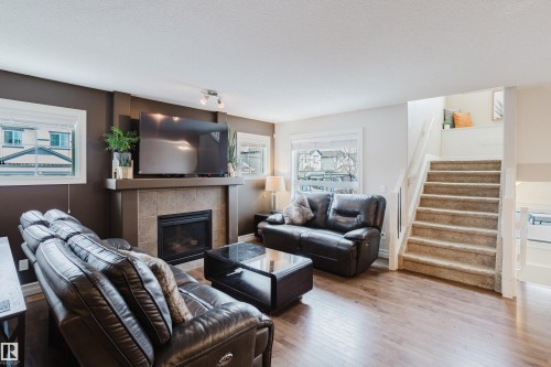 1740 59 Street, Edmonton, AB - Indoor Photo Showing Living Room With Fireplace