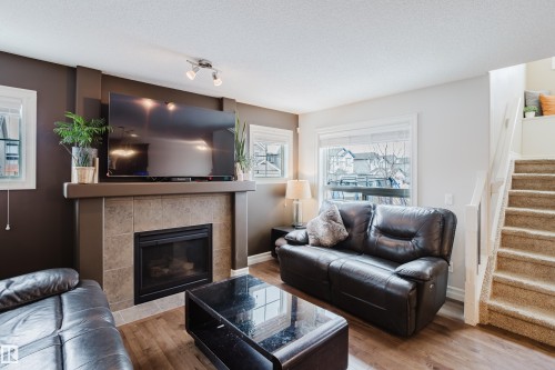 1740 59 Street, Edmonton, AB - Indoor Photo Showing Living Room With Fireplace