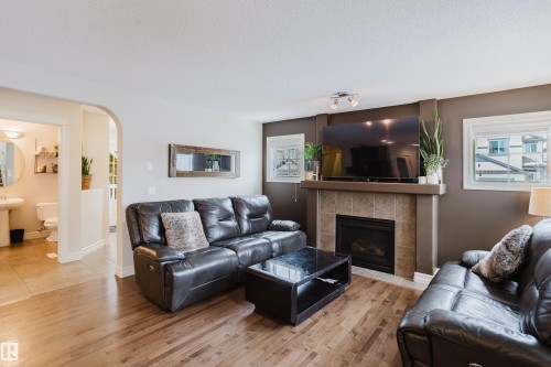 1740 59 Street, Edmonton, AB - Indoor Photo Showing Living Room With Fireplace
